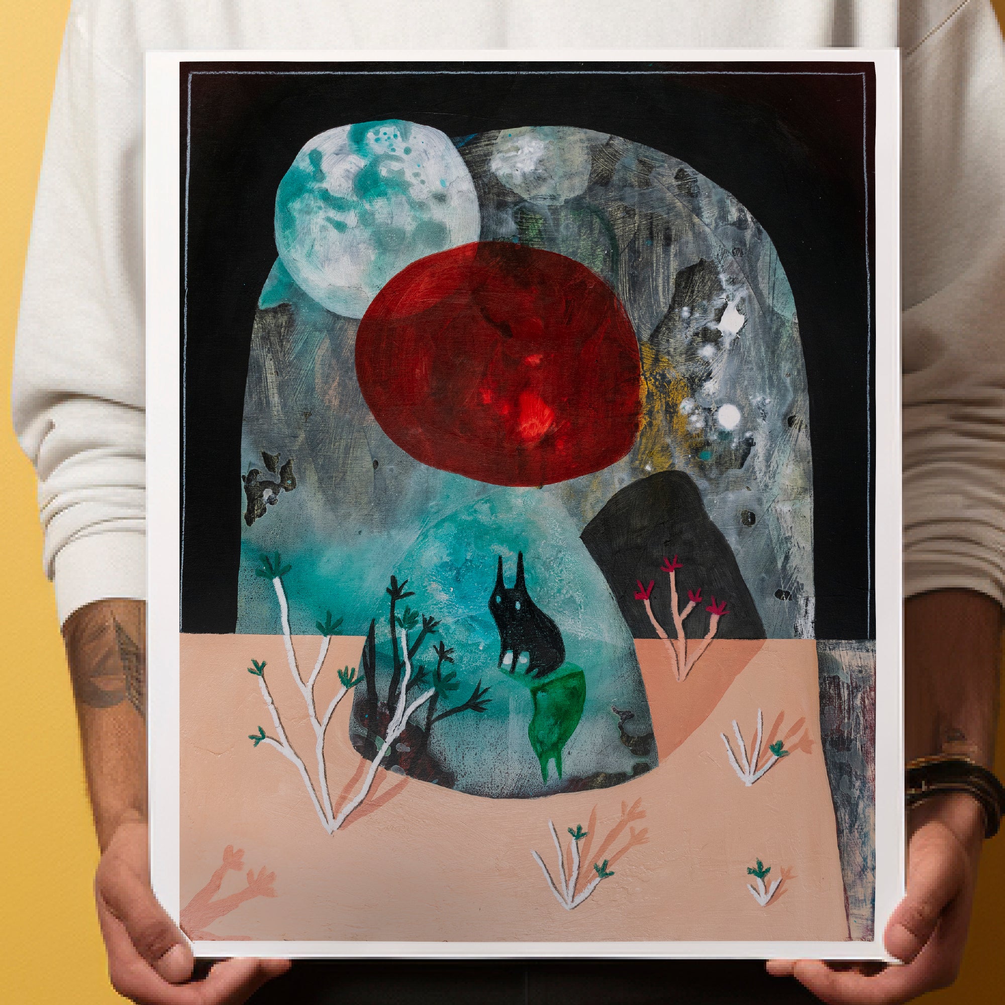 Picture of the torso of a person in a white sweatshirt holding one Frantoio Grove Olio Nuovo art print by artist KAZLAND. 