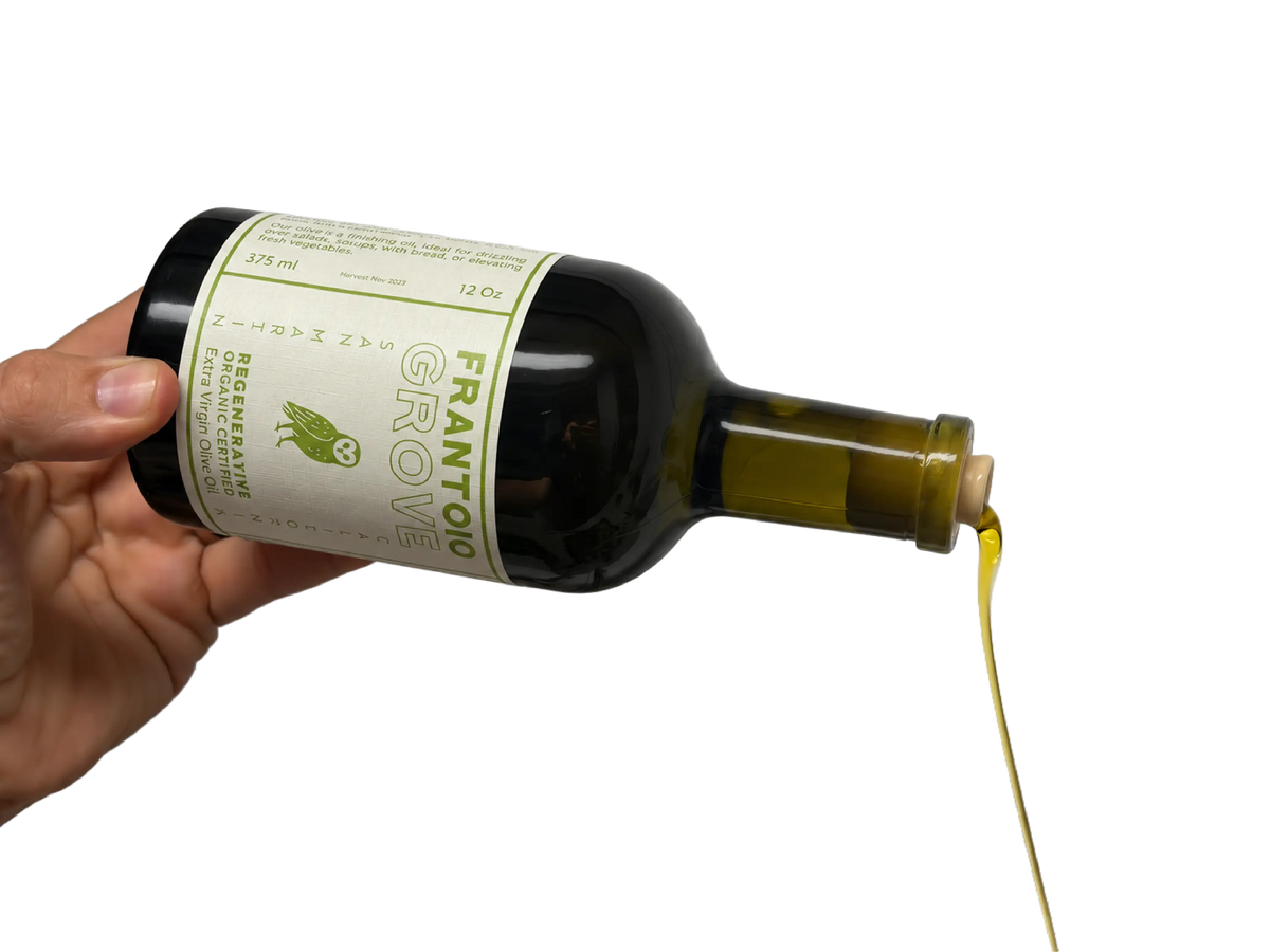 Frantoio Grove olive oil being poured