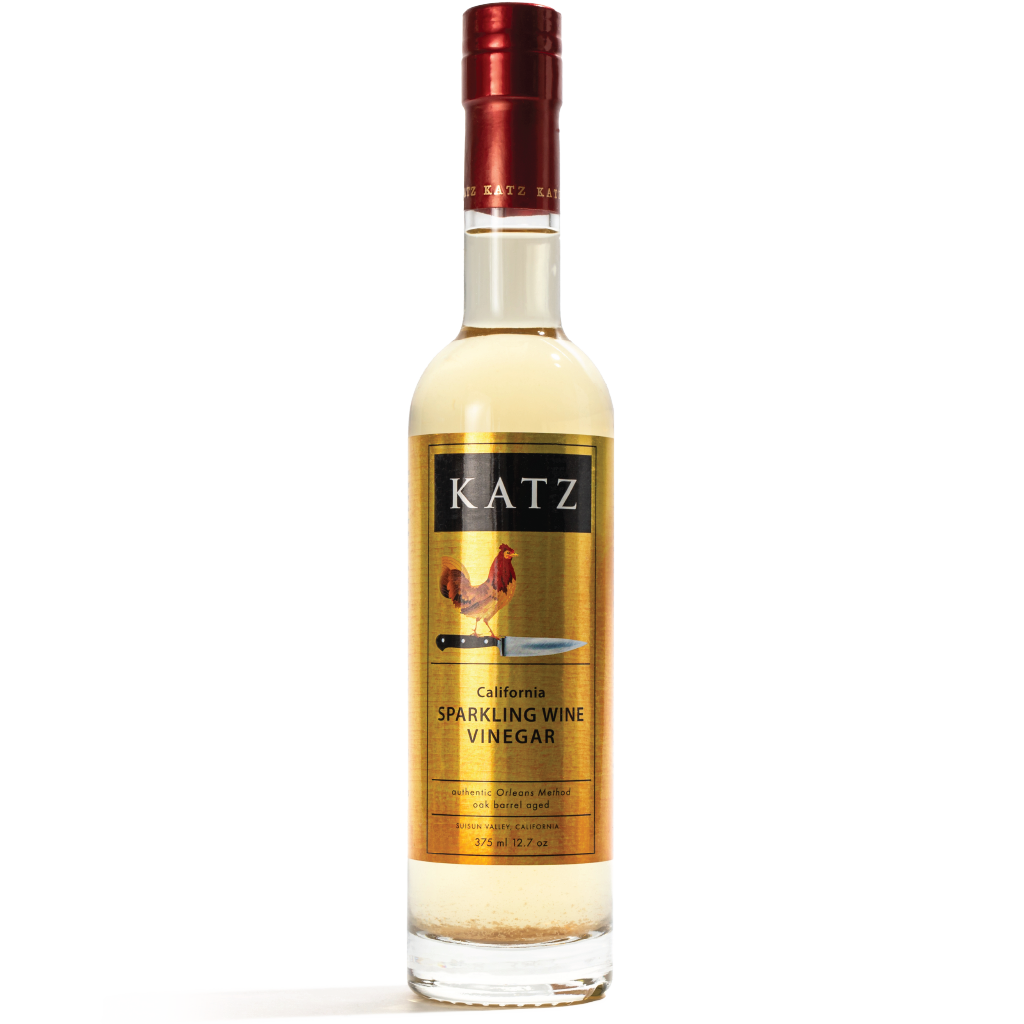 Bottle of KATZ California Sparkling Wine Vinegar on a transparent background.