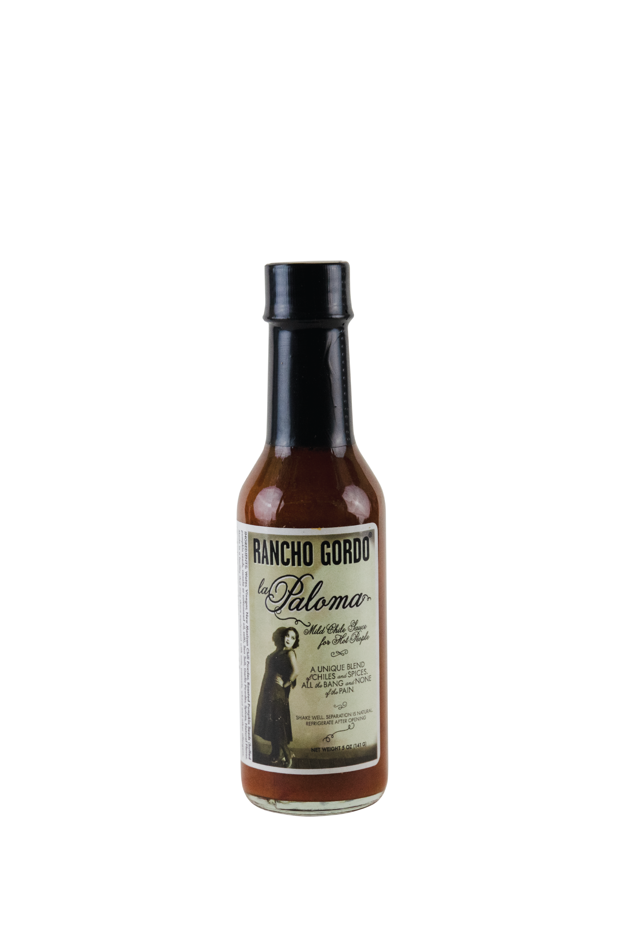Image of a 5 oz glass bottle of Rancho Gordo La Paloma hot sauce on a white background. Label art is of a woman with dark, curly hair, who looks like she comes from the 1920s. Additional text on bottle reads: Mild chile sauce for hot people. A unique blend of chiles and spices, all the bang and none of the pain. Shake well, separation is natural, refrigerate after opening.