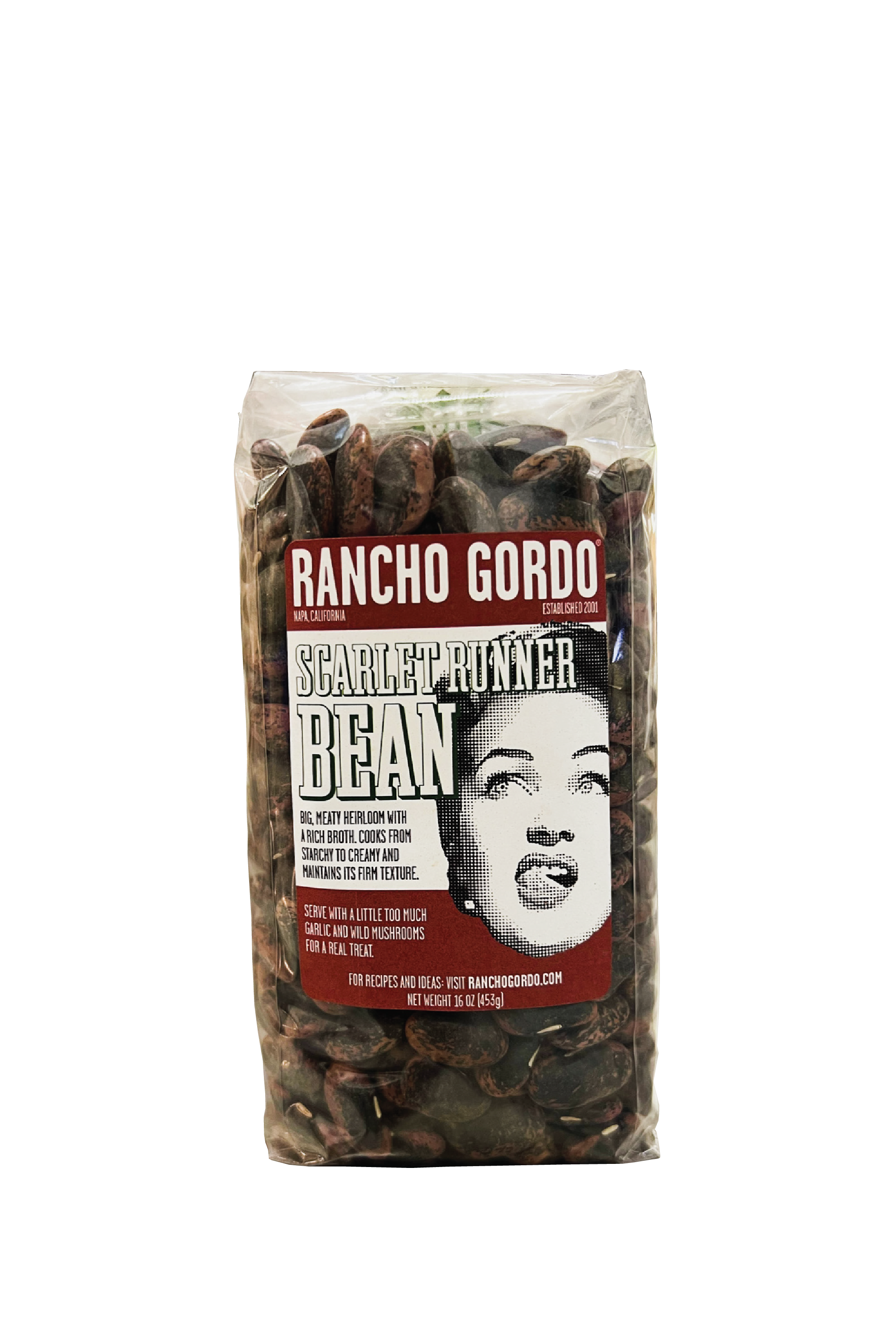A One Pound Bag Of Rancho Gordo Scarlet Runner beans on a white background. Red and white label with an image of the face of a woman licking her upper lip. Additional text on bag reads: Big, meaty heirloom with a rich broth. Cooks from starchy to creamy and maintains its firm texture. Serve with a little too much garlic and wild mushrooms for a real treat.