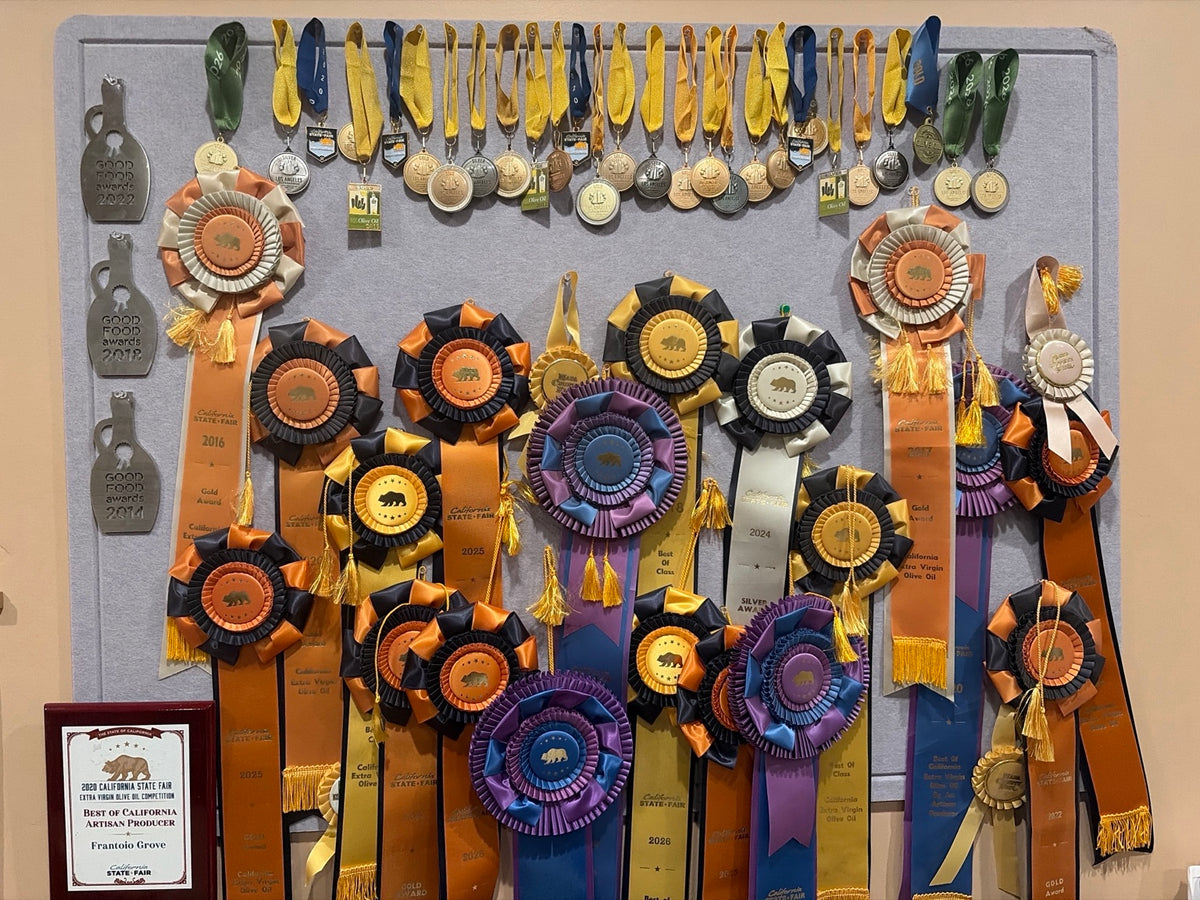 Frantoio Grove's medals, California State Fair rosettes and Good Food Awards