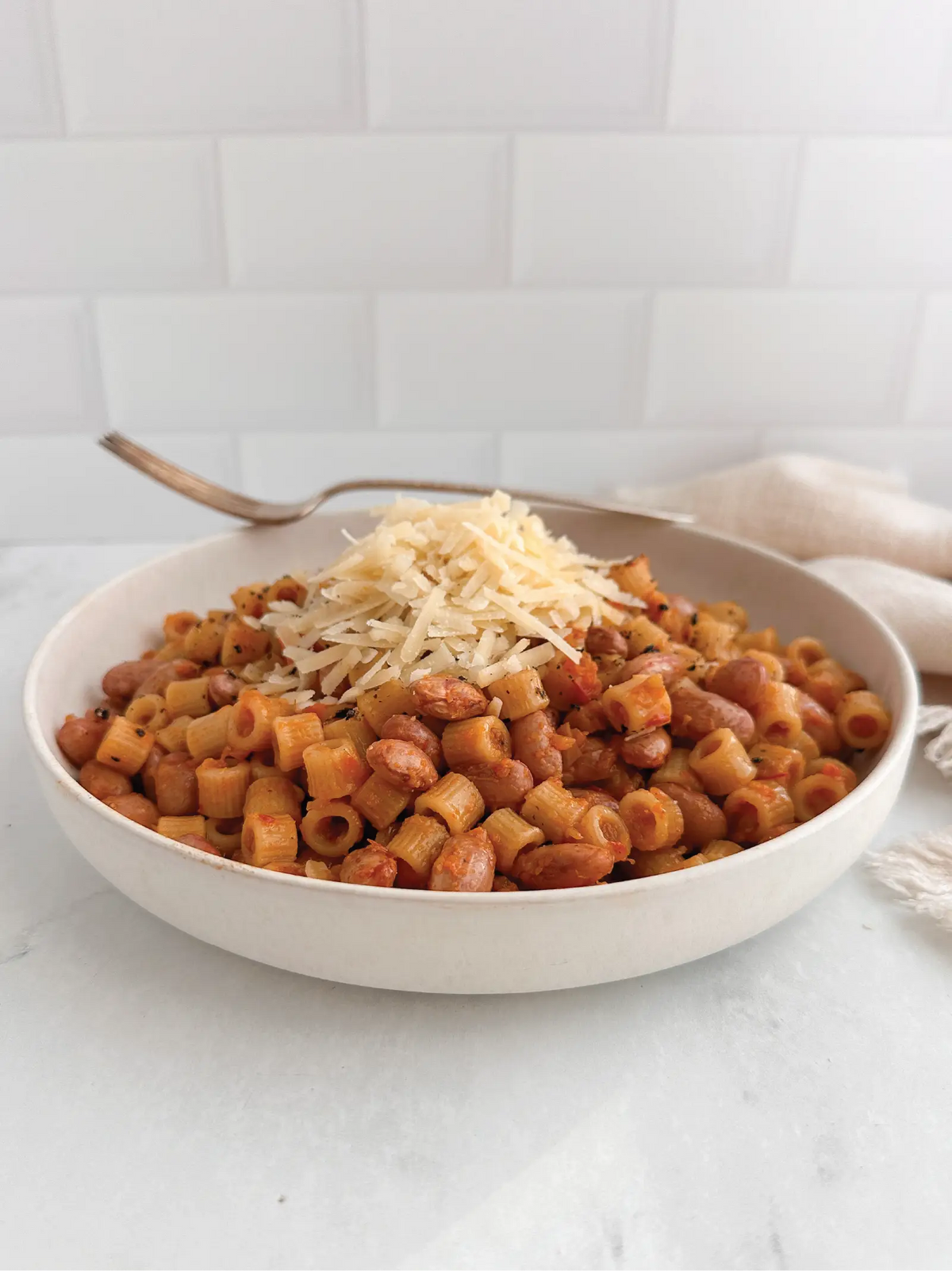 Pasta e fagioli with beans, pasta, and olive oil